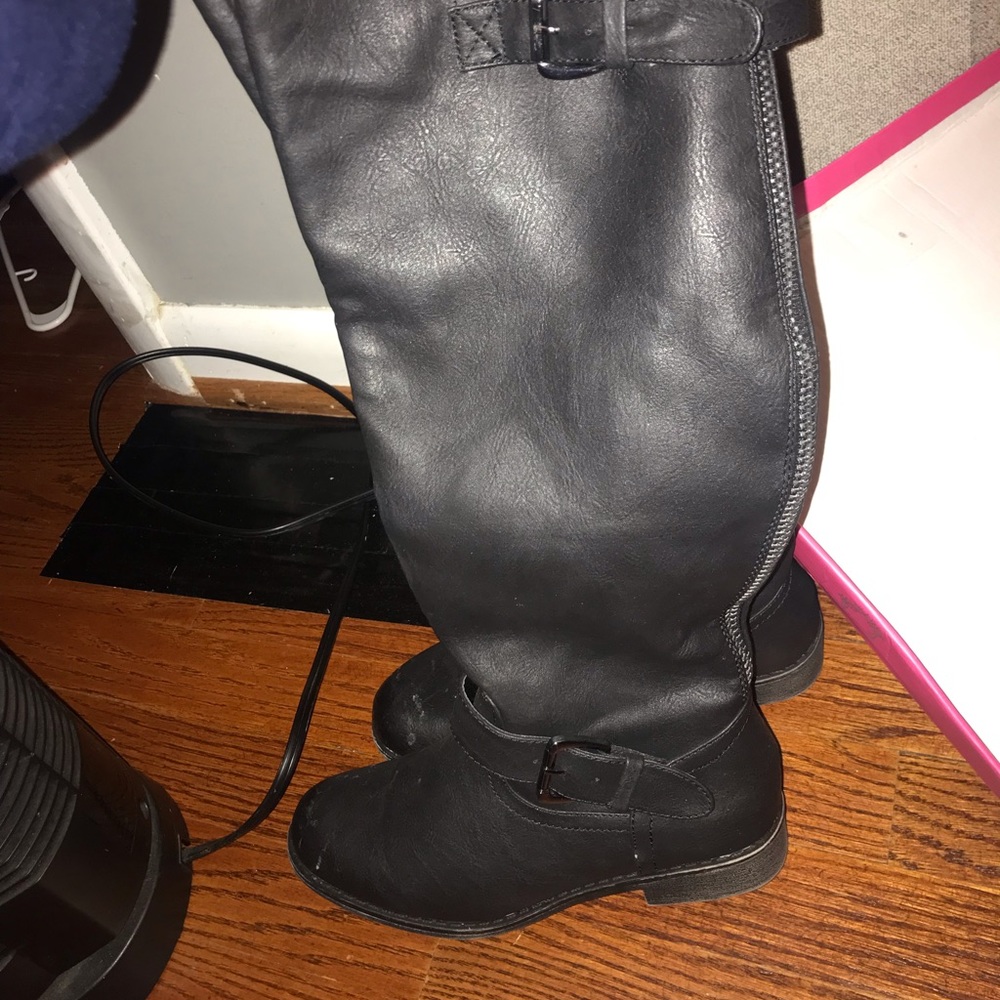Black leather buckle boots